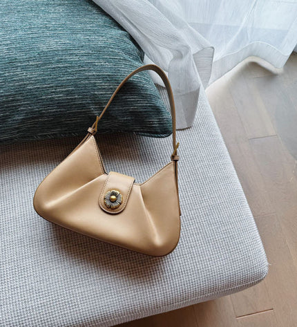 The "Aura Pleat Shoulder Bag"
